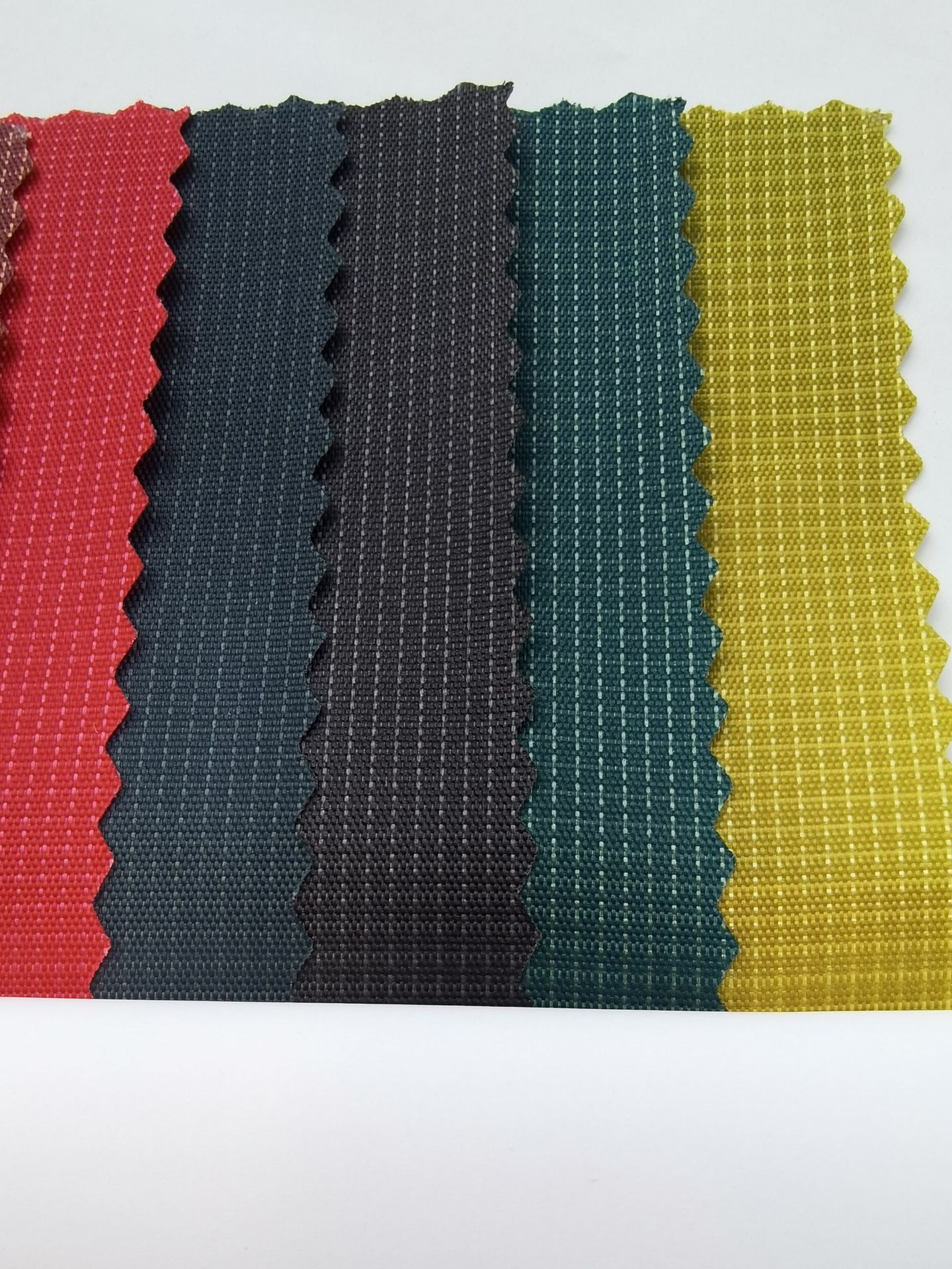 200d尼龙布一分双色格子布料防水pu一次尼龙面料定制抗菌运动包布