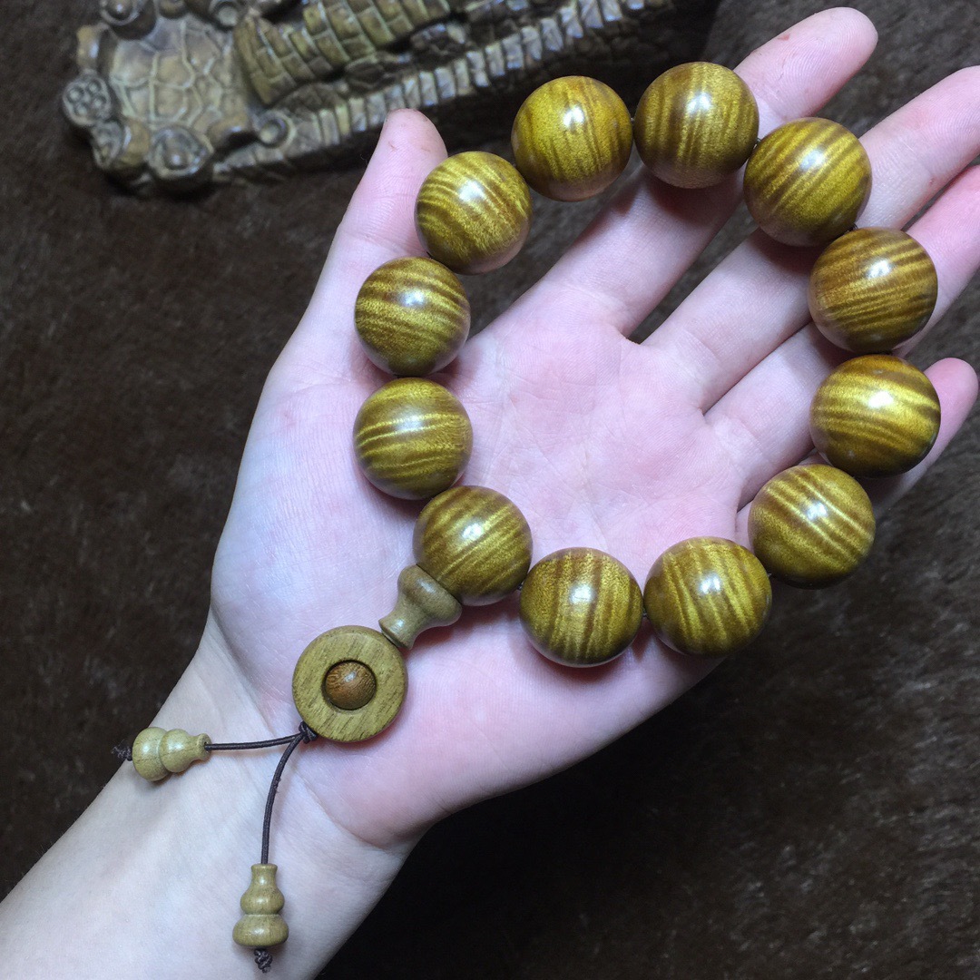 金丝楠木满水波佛珠手串2.