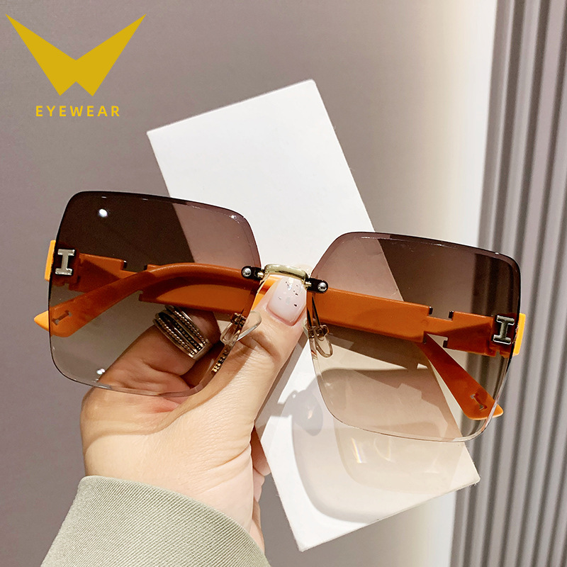 2023 New Frameless Two-Color Gradient High Sense Women's Fashion Driving Sunglasses Fashion Sunglasses Wholesale Factory