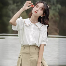 法式娃娃领上衣女夏2024新款韩版小花刺绣泡泡短袖甜美白色衬衣