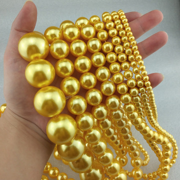 05 kg品名:金黄色仿珍珠项链尺寸:长度一条80cm左右周长珠子直径:6