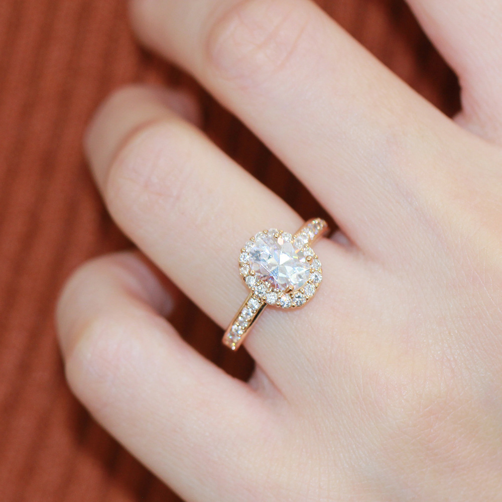 太阳云 韩版韩式精致镶钻椭圆仿真钻戒气质女款时尚百搭订婚戒指