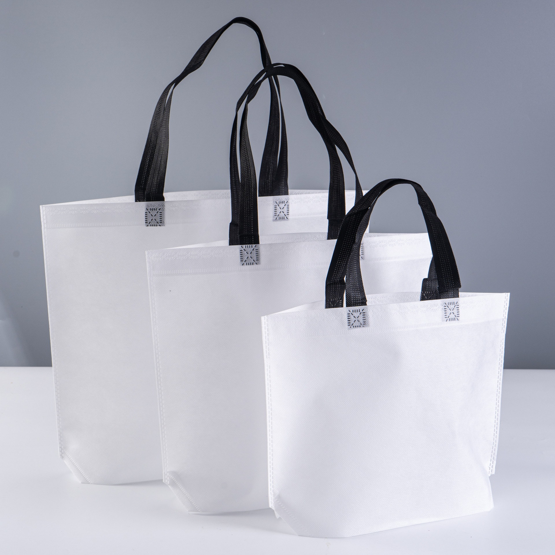 现货订做加厚无纺布服装袋撞色广告促销手提袋加急印logo袋子