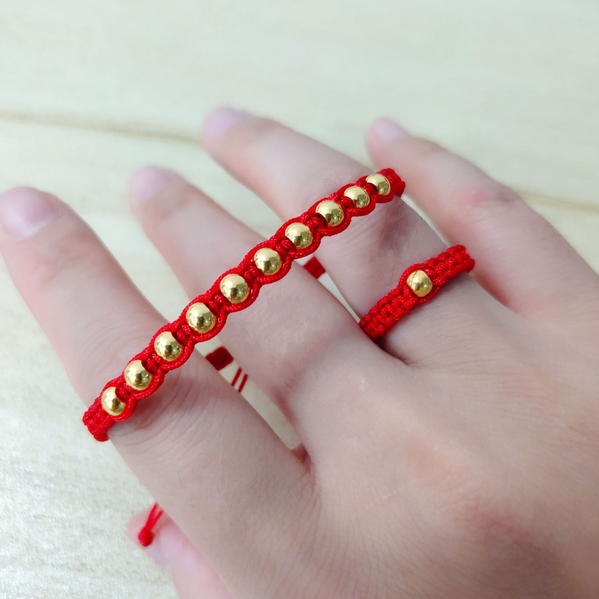 黄金小金珠十全十美手链足金3d硬金圆珠女本命年红手绳情侣手链