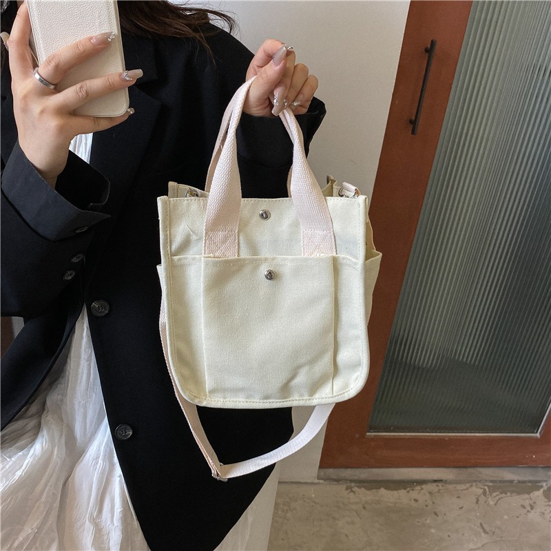 Portable Retro Small Square Bag Women's Bag Spring 2023 New Simple Canvas Bag Large Capacity Fashion Portable Messenger Bag