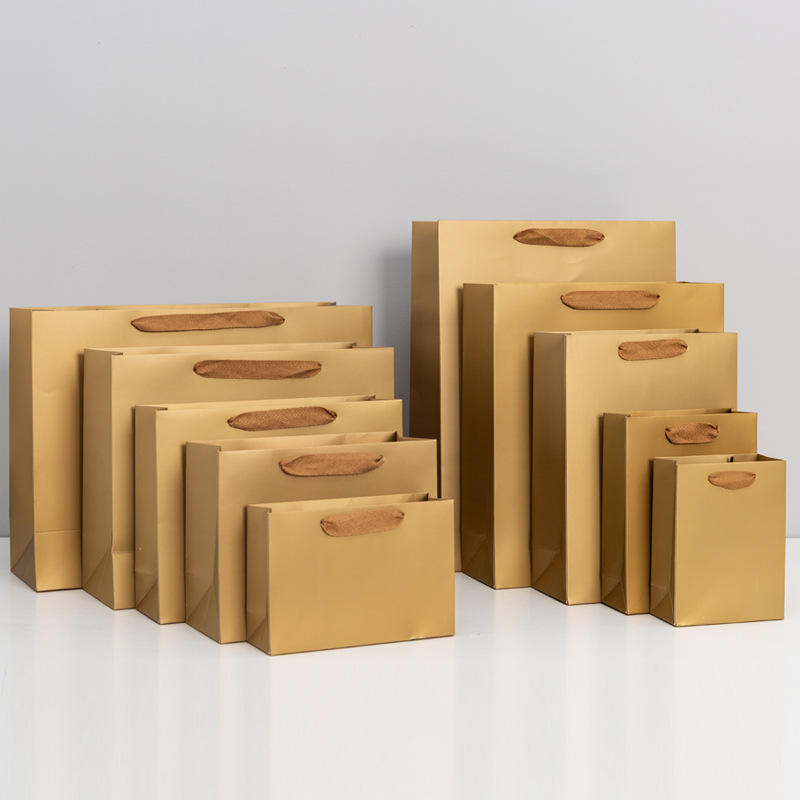 现货批发金色礼品纸袋服装店高档手提袋购物包装袋子可加印logo