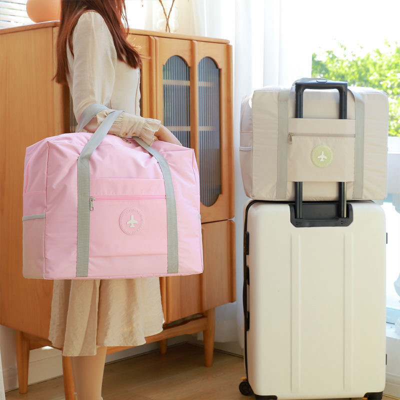 大容量旅行包女可折叠行李待产包收纳袋子便携手提简约圆标飞机包