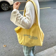 夏季大容帆布包包可爱奶黄字母刺绣托特包女2024新款旅行收纳包