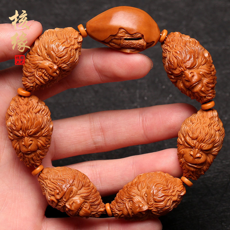 9大籽 齐天大圣核雕文玩把件 橄榄胡雕刻猴子手链-阿里巴巴