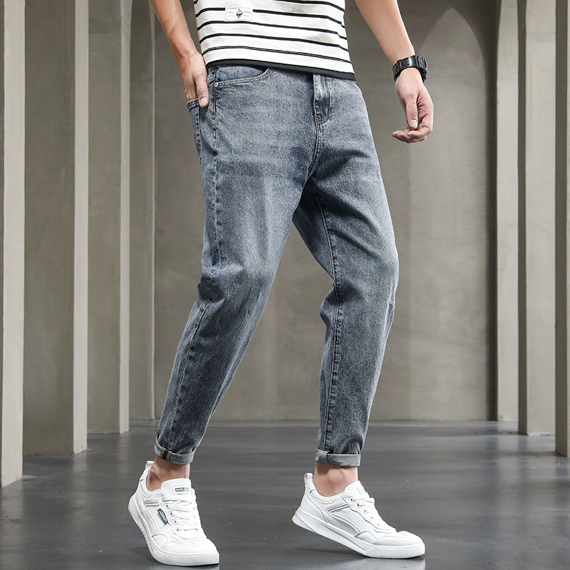 男士小直脚休闲牛仔裤春夏季韩版潮流宽松修身哈伦裤时尚品质裤子
