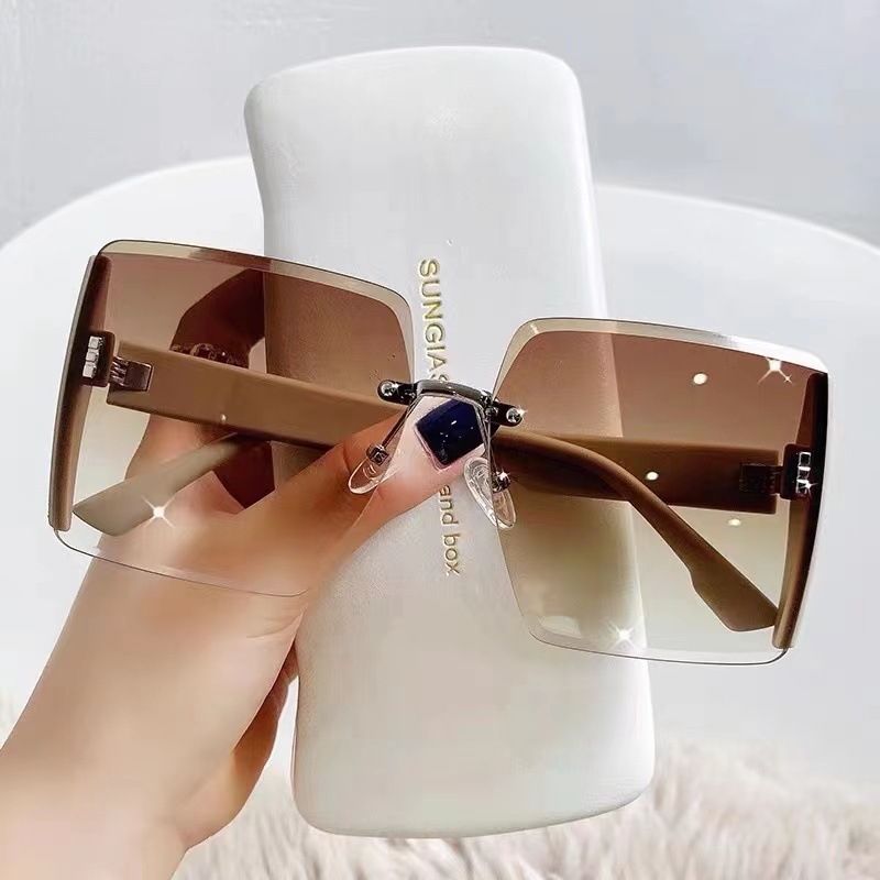 2022 New Frameless Trimming Uv Protection Sunshade Sunglasses Women's Fashion Trending on Tiktok Ins Same Sunglasses