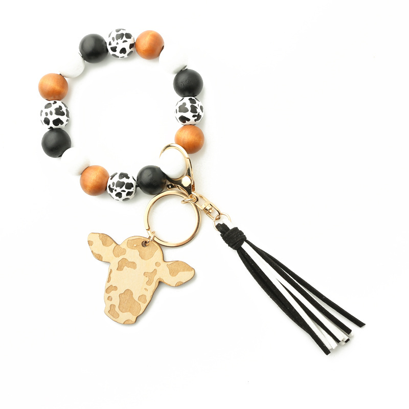 New Products in Stock European and American Ornament Tassel Pendant Western Cowboy Bracelet Cow Wooden Beads Bracelet Cow Head Keychain