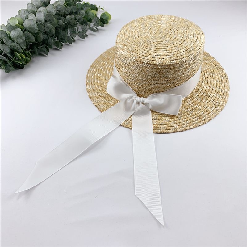 韩版麦秆草帽编织平顶丝带蝴蝶结飘带宽檐夏减龄三亚度假沙滩遮阳