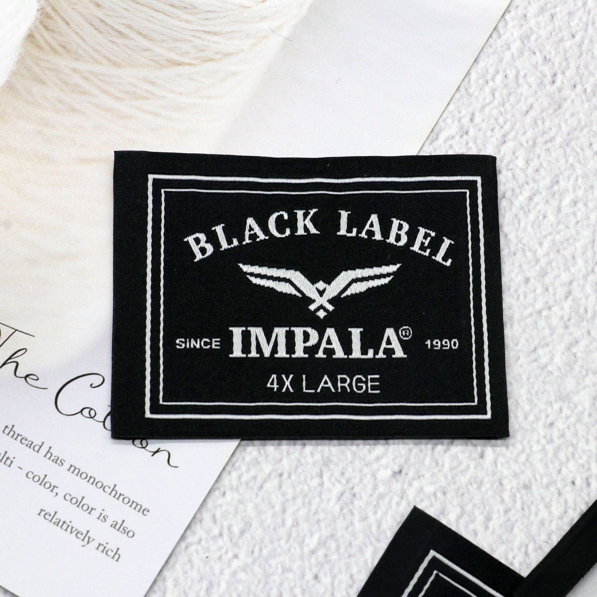 厂家服装大牌织唛高端细砂高密织标西装领标箱包商标布标