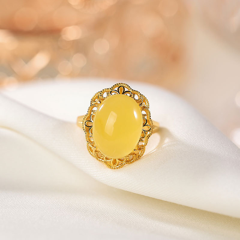 壹鹿银s925纯银镀金天然琥珀蜜蜡戒指个性气质镂空花纹蛋面指环