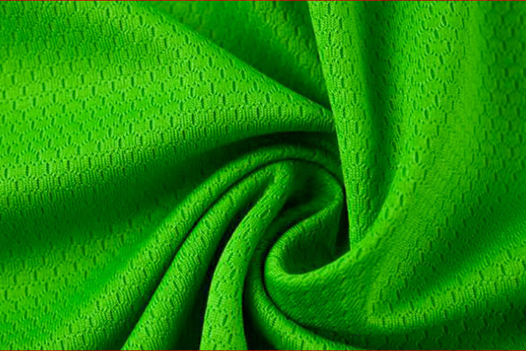 厂家现货全涤针织足球网网眼布 轻薄舒适运动服球衣面料