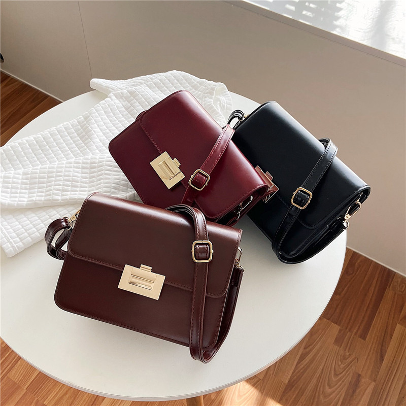 2021 New European and American Fashion Pu Simple Solid Color Lock File Holder Small Square Bag Shoulder Messenger Bag Fashion Women's Bag
