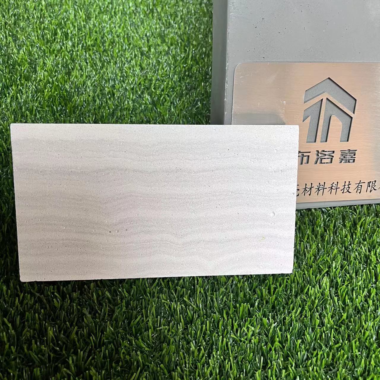 人造洞石布洛嘉厂家直销粗纹灰底纹洞石室内外墙面干挂泥客石