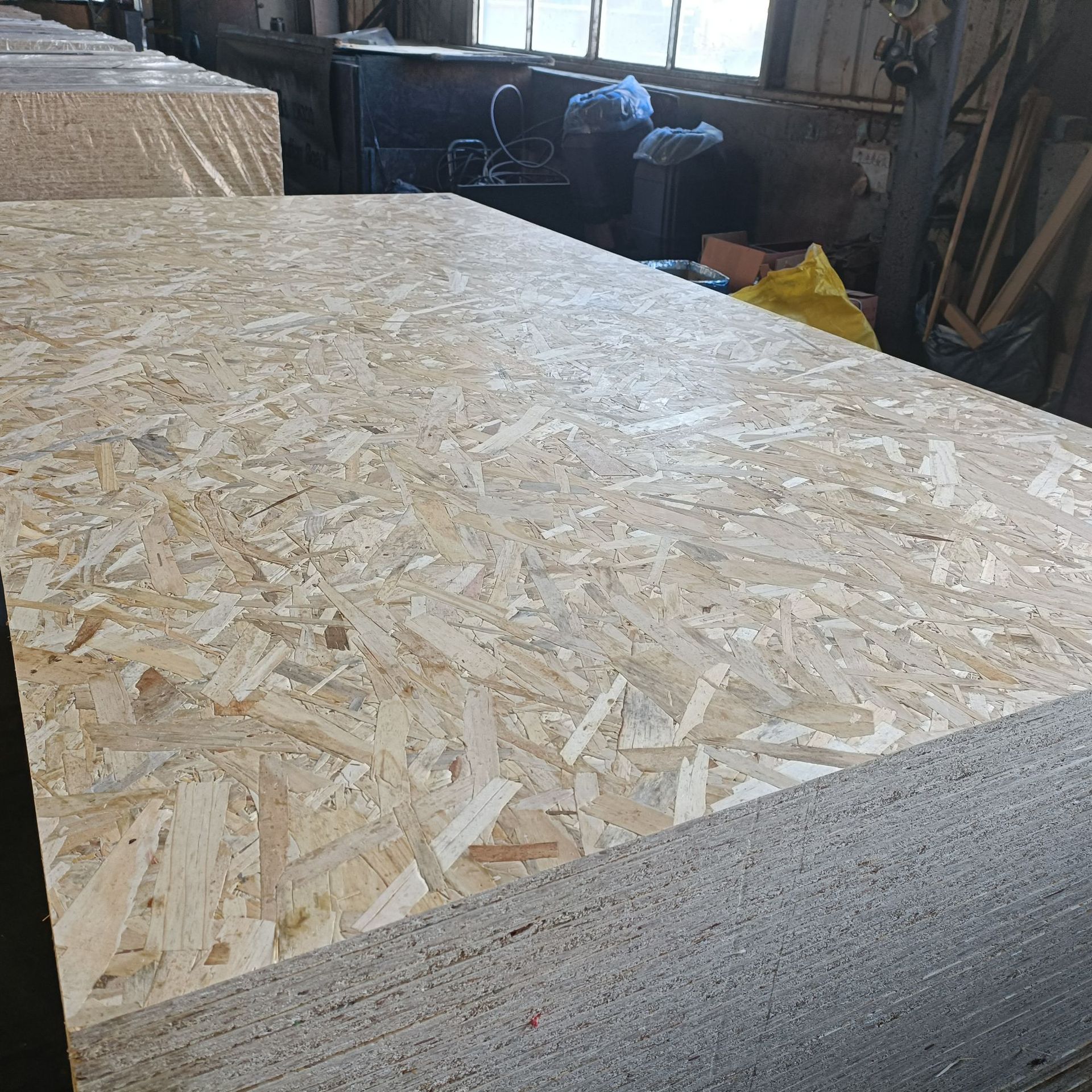 osb定向刨花板欧松板实木板材12mm 定向结构建筑装饰墙板大量批发