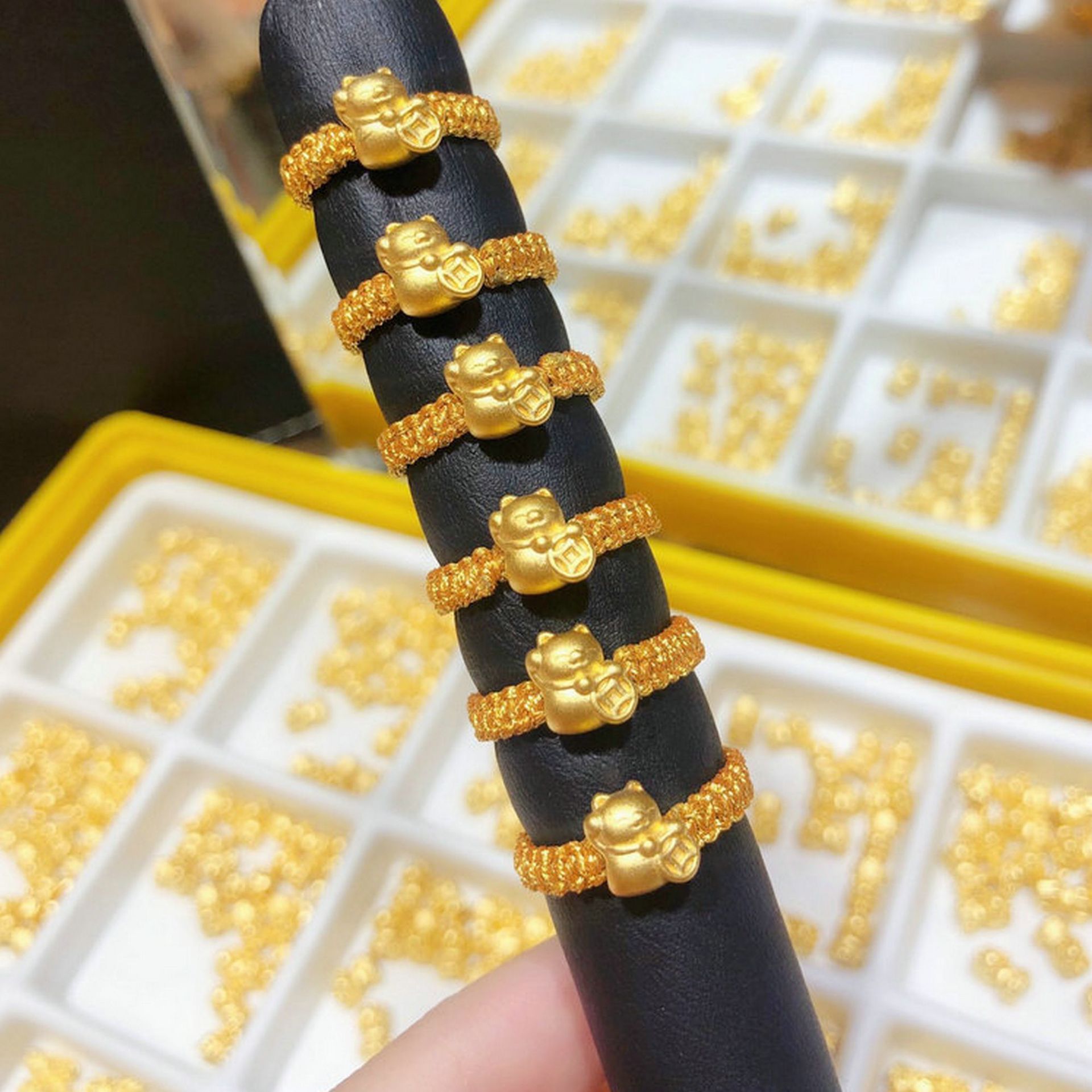 3d硬金黄金招财猫转运珠戒指本命年红绳编织999足金情侣戒指批发