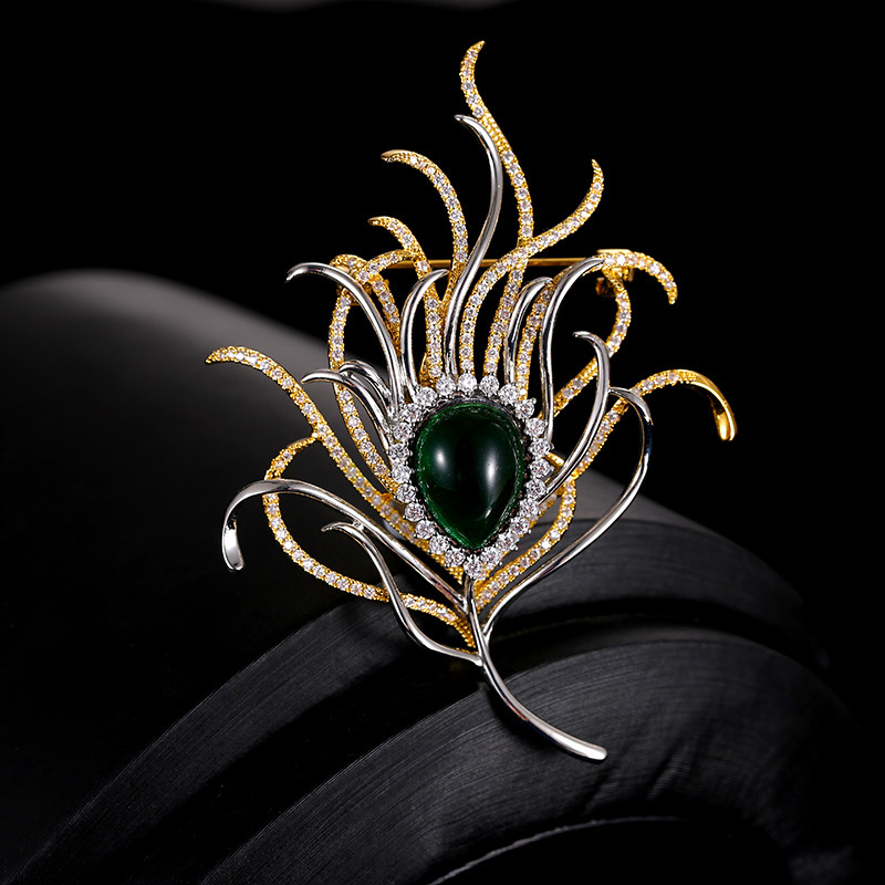 千族银 直播爆款双色金复古凤凰羽毛胸针 祖母绿宝石西服别针胸花