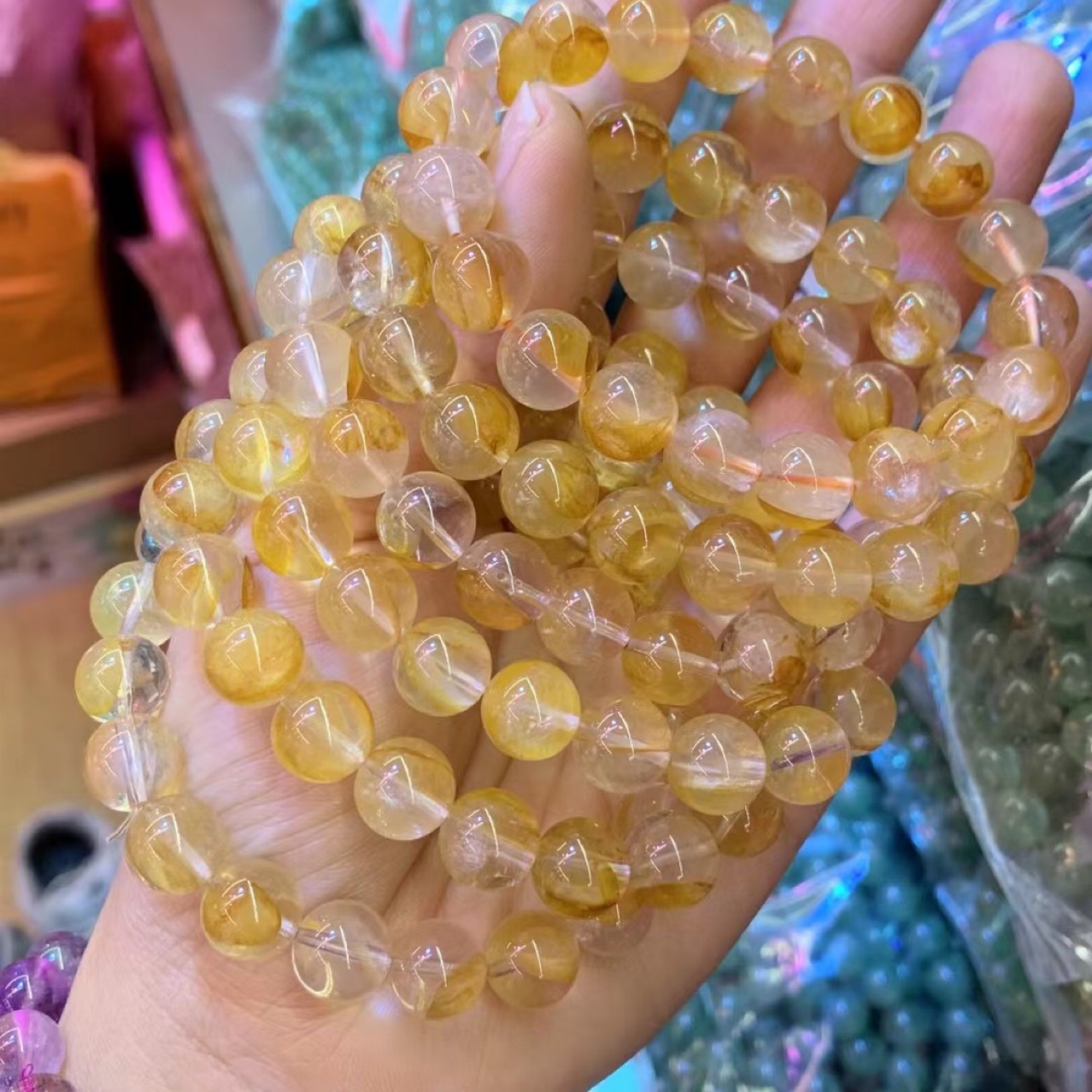 天然黄胶花水晶手串黄麒麟彩虹体联系客服挑选大小等级直播中