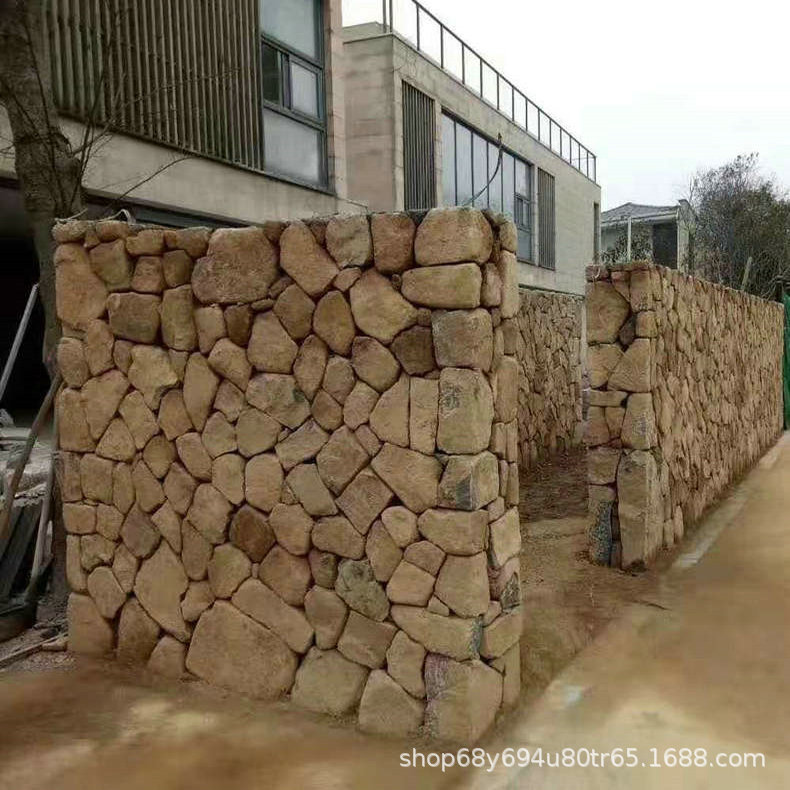 厂家供应不规则花园垒鹅卵石景墙石 景区砌墙毛石 垒墙护坡石