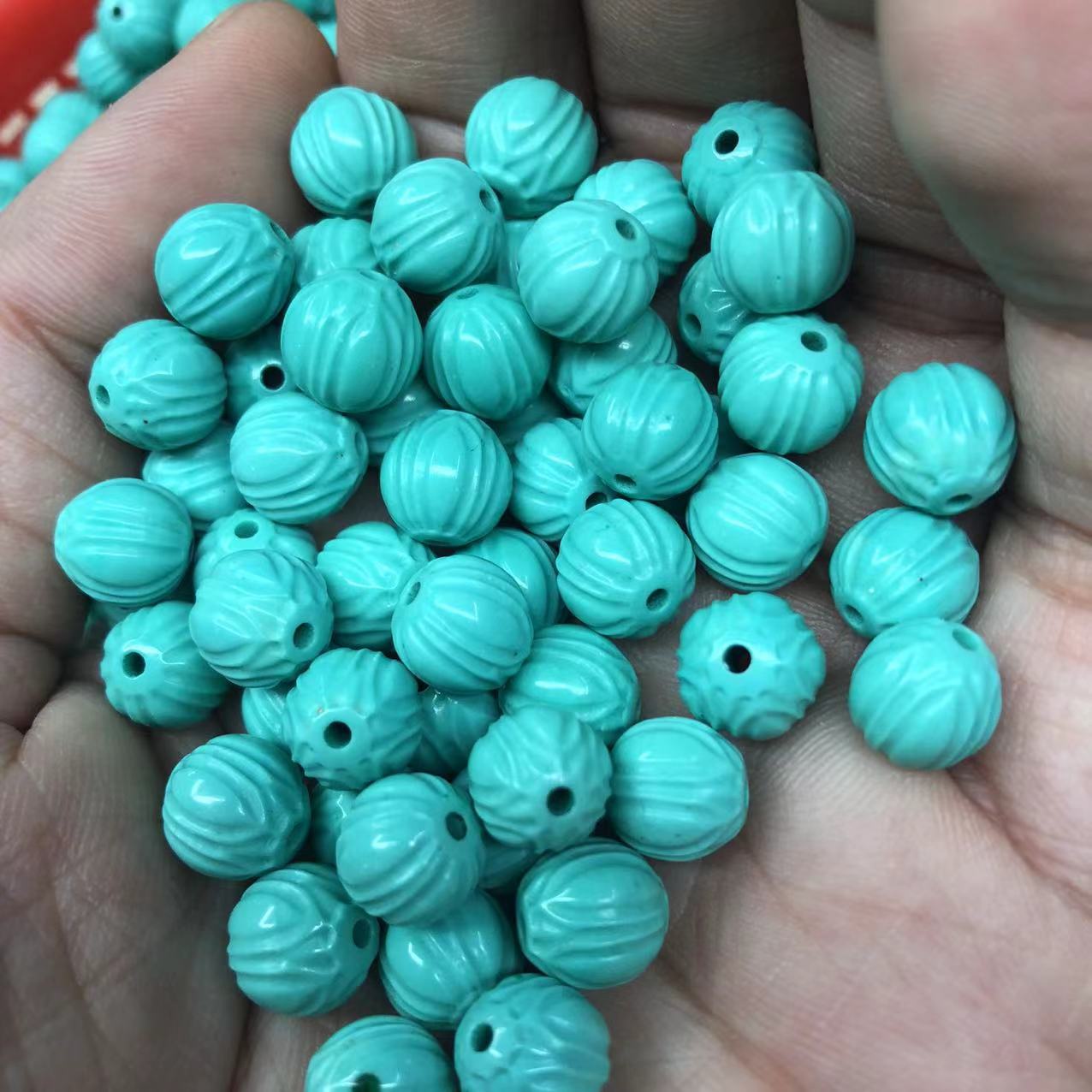 厂家直供菱镁矿二代优化粉压注胶绿松石雕刻莲花珠