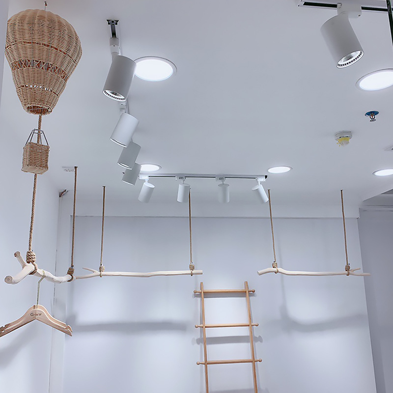 服装店树枝挂衣架原木色吊顶悬挂衣杆童装展示架上墙壁挂衣服吊挂