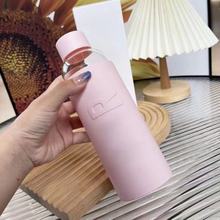 D家柜台礼粉色硅胶水瓶大容量可爱水杯欧美轻奢玻璃保温水杯批发
