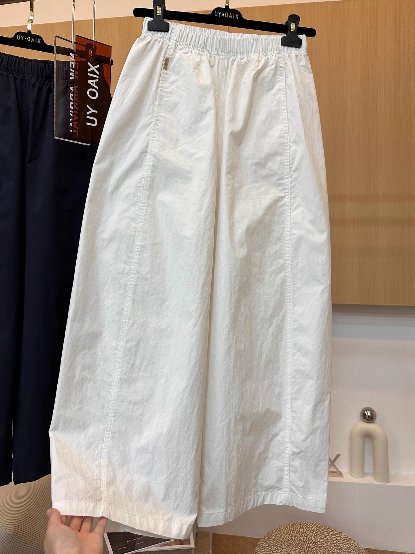 高级欧货白色弯刀休闲裤女夏季新款今年流行好看水洗棉九分阔腿裤