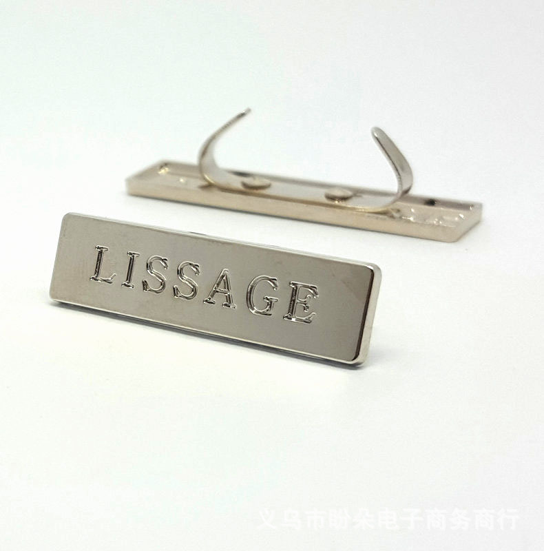 Metal Logo Trademark Handbag Nameplate Manufacturers Make Metal Box and Bag Hardware Accessories Zinc Alloy with Foot Signs