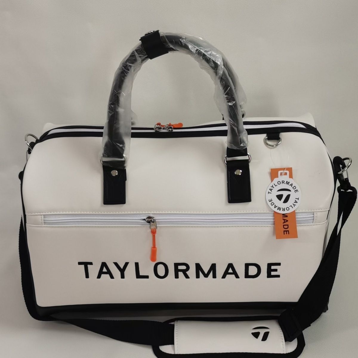 新款高尔夫手提包 时尚挎包 男女轻量衣服包-阿里巴巴