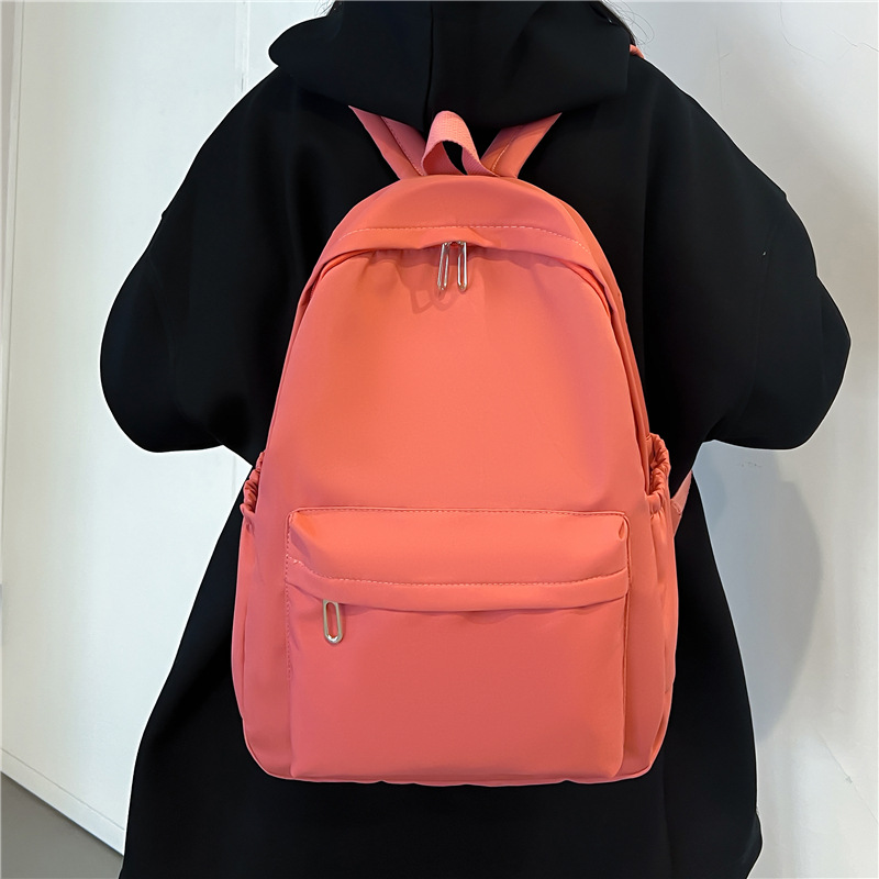 纯色书包新款简约校园背包大容量初中生尼龙布双肩包韩版定制logo