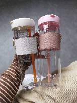 A Plastic Cup with Scented Tea Filter Net Crossbody Leather Cover Straw Tumbler Sealed Leak-Proof