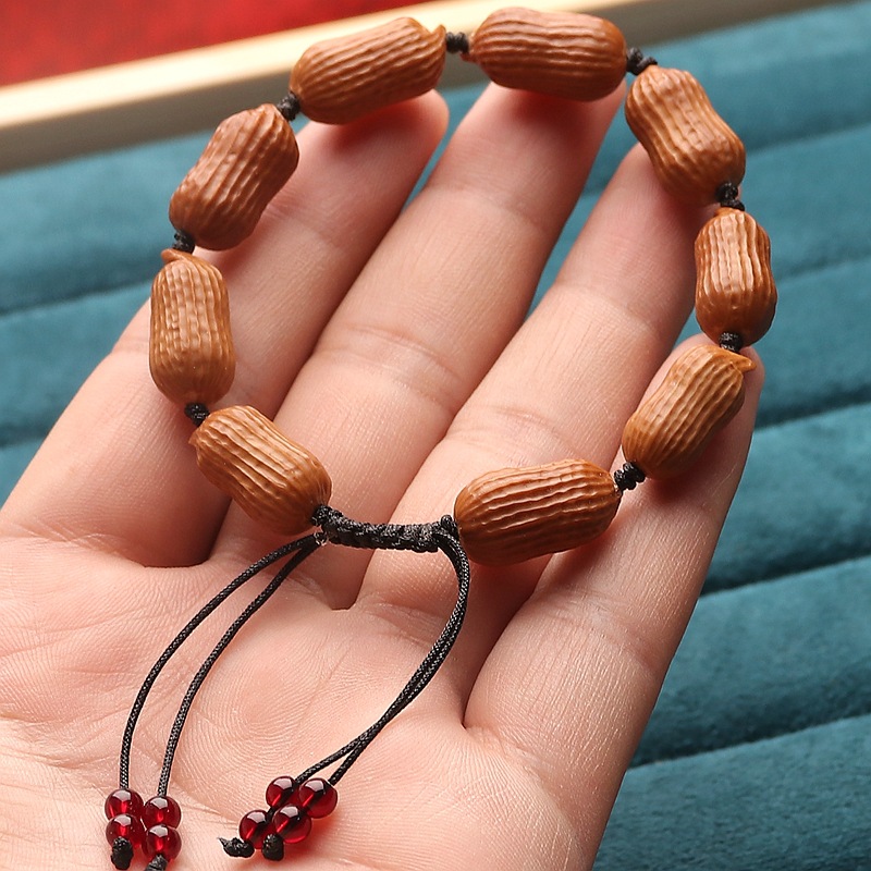 文玩小手捻橄榄核花生手串手工核雕小籽手链老料油核多子多福素串