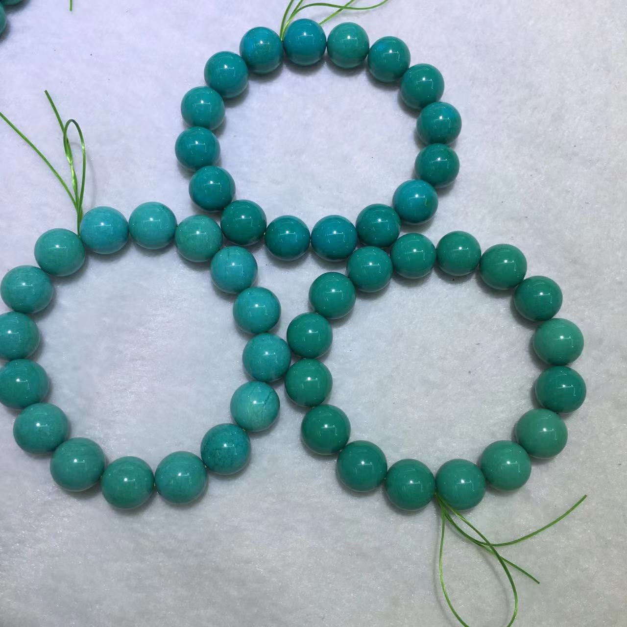 菱镁矿高瓷蓝绿松石圆珠手链散珠批发文玩优化松石男手串盘玩变色