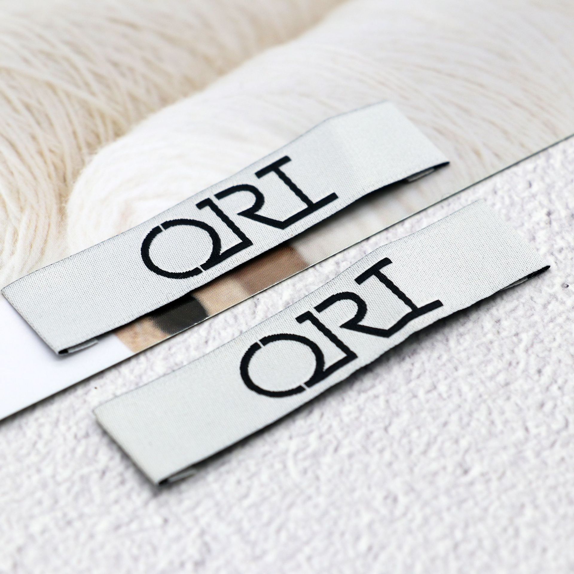 厂家服装大牌织唛高端细砂高密织标西装领标箱包商标布标