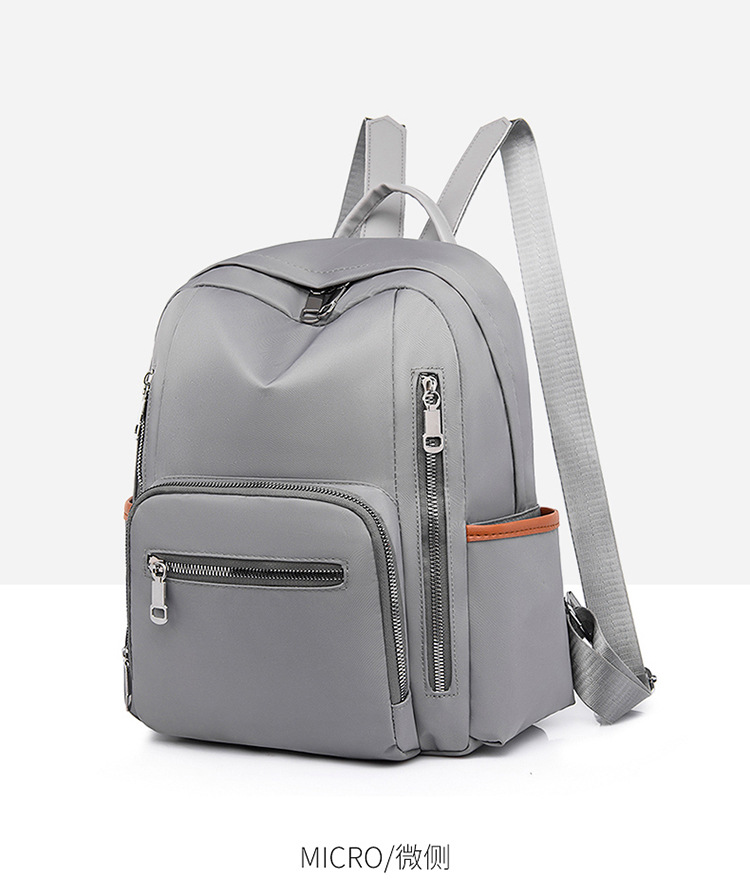 牛津布双肩包女2021新款时尚大容量学生书包轻便简约潮户外旅行包