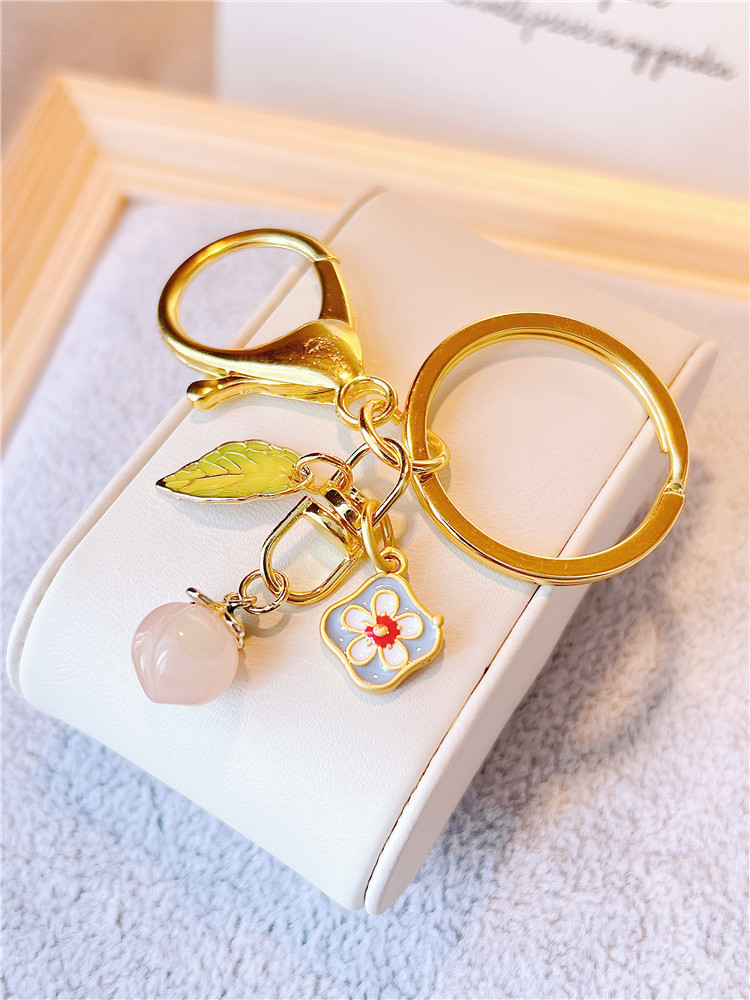 天然玉石玉髓水蜜桃钥匙扣挂件招桃花ins网红精致小巧小饰品挂饰