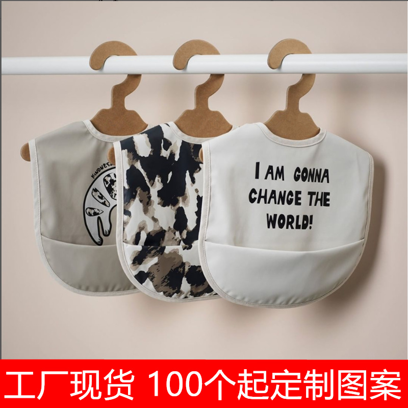 外贸工厂婴儿童防水pu软塑料皮革围嘴宝宝饭兜围兜罩衣口水巾跨境