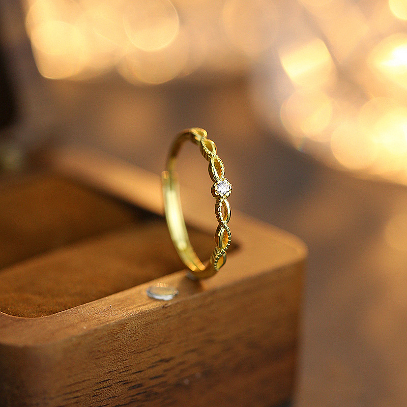 s925纯银镂空雕花缠绕开口戒指女小众设计冷淡风高级单钻指环批发