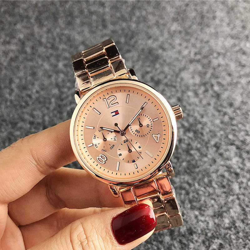 外贸手表批发 时尚三眼日内瓦手表 钢带男士女士银色手表 低价