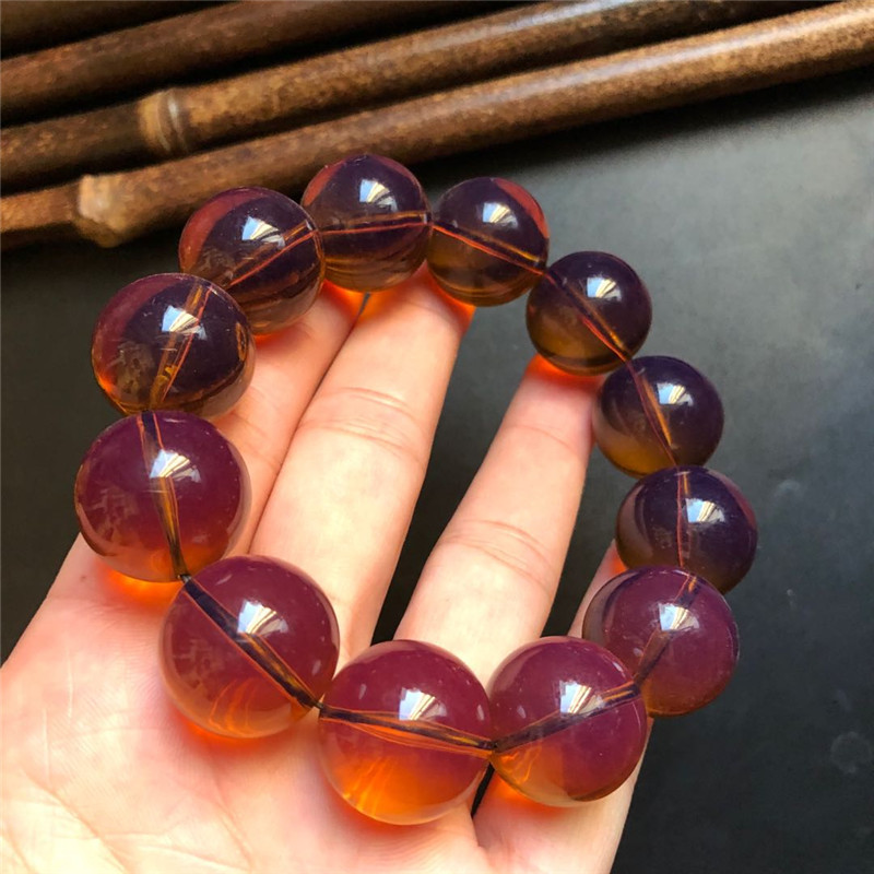 直播二代茶琥珀紫罗兰单圈圆珠手串浮盐水有荧光遇自然光黑底变色