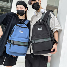 外贸新款中学生双肩包韩版潮流反光条情侣背包大容量电脑背包批发