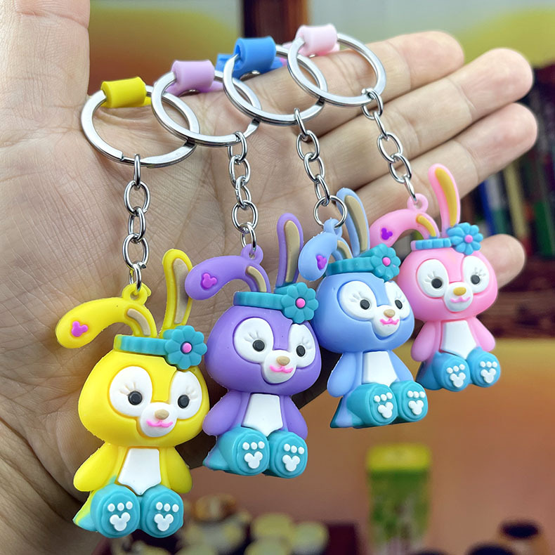 23 Years New Cartoon Doll Flexible Rubber Key Chain Car Key Chain Decorative Pendant Promotional Gifts