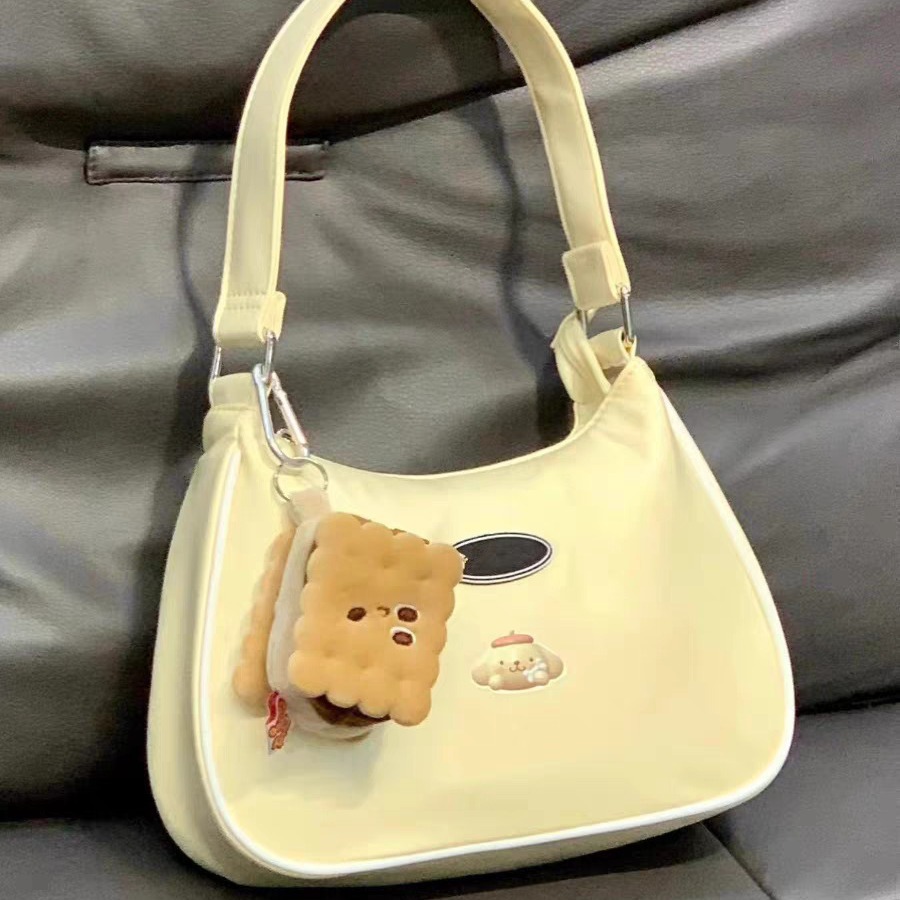 日系ins风可爱甜美少女手提包2024新款夏日黄饺子包单肩包腋下包-阿里