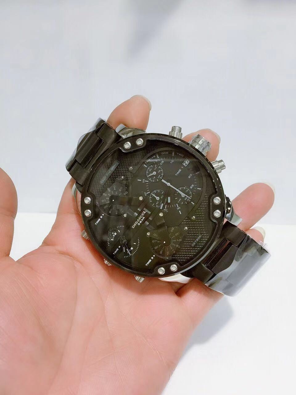 迪赛卡/disaicel不锈钢胶带大盘男士硅胶带男士女士腕表石英手表