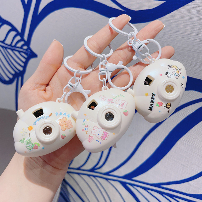 Trending Cartoon Cloud Camera Projection Lamp Keychain Children's Mini Ambience Light Key Chain Claw Machine Small Gift