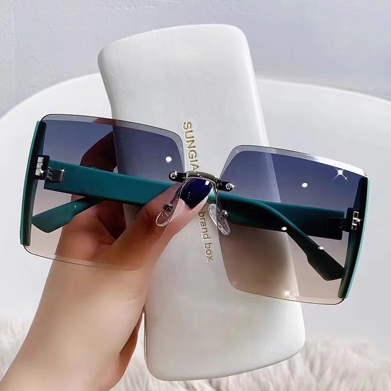 2022 New Frameless Trimming Uv Protection Sunshade Sunglasses Women's Fashion Trending on Tiktok Ins Same Sunglasses